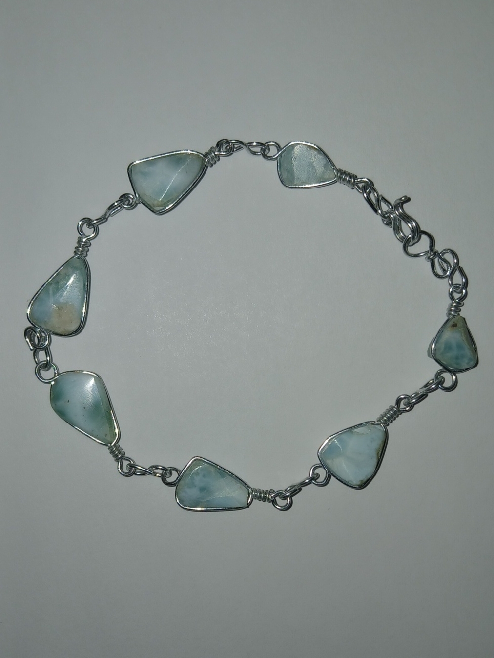 Silver Bracelet Featuring Light Blue Stones